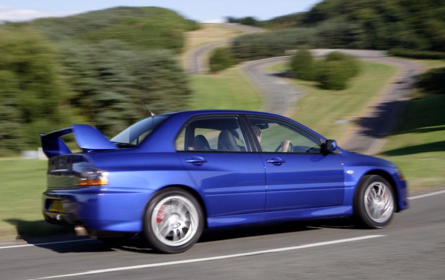  Mitsubishi Lancer Evolution IX 2005 года  (фото 23 из 32)
